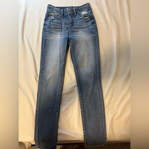 Buckle Women's Skinny Jeans in distressed Blue